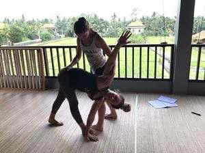 assisted yoga pose