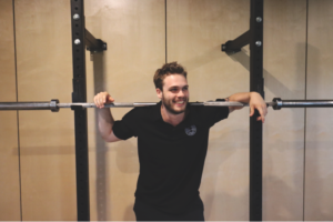Man under barbell
