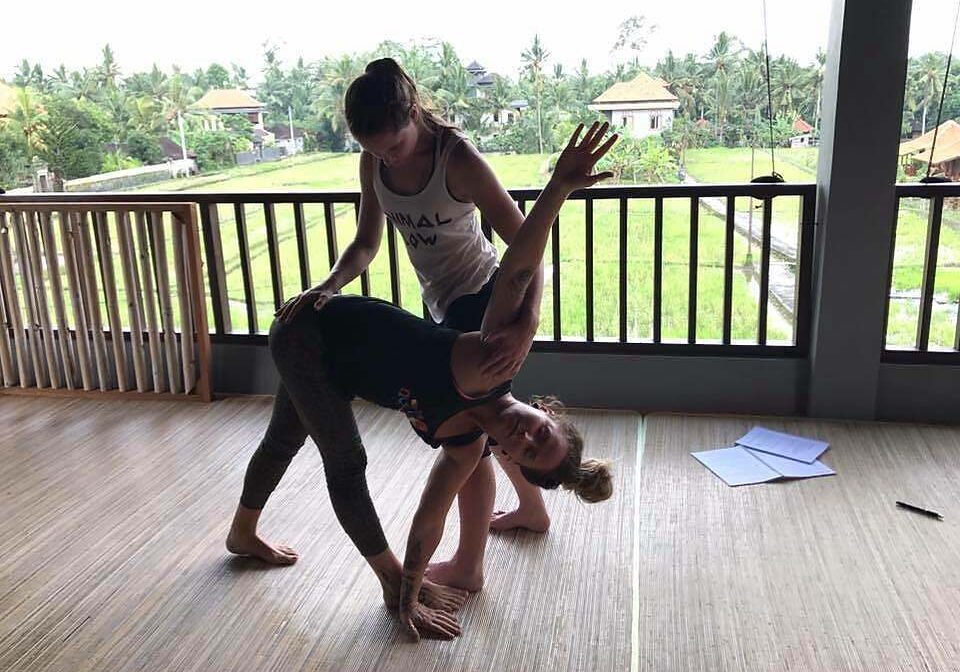 assisted yoga pose